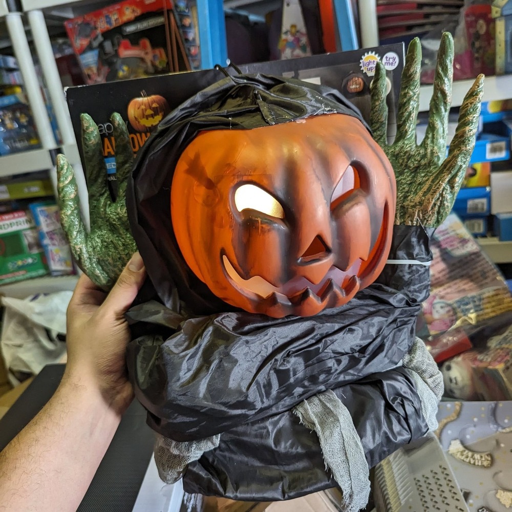 Spooky Village 6 ft Hanging‎ Pumpkin Man with Lights & Sound
